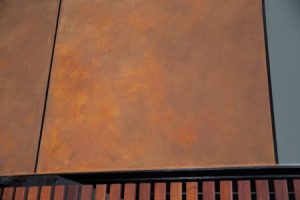 rust effect paint on exterior wall panels in Albion